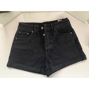 Black denim shorts.